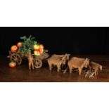 A Charming Late 19th Century/Early 20th Century Folk Art Wooden Model of an open Ox-drawn cart with