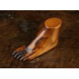 A Small Treen Snuff Box carved in the form of a foot with a hinged lid to the underside,