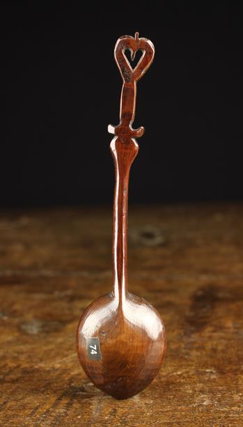 A Rare 18th Century Carved Treen Spoon of rich colour and patination. - Image 2 of 3