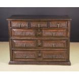 A Large Antique Two-part Oak Chest of Drawers in the 17th century style.