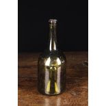 An 18th Century Green Glass Wine Bottle with high 'kick-up' base 10" (26 cm) in height.