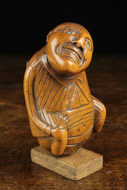 An Early 19th Century Carved Boxwood Snuff Box in the form of a defecating man. - Image 2 of 6
