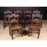 A Set of Six Carved Oak Derbyshire Type Dining Chairs in the 17th century style.