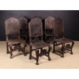 A Set of Six 18th Spanish Carved Walnut & Tooled Leather Chairs.
