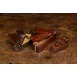 Three 19th Century Mahogany Coffin Shaped Snuff Boxes: The smallest with pique work to the lid