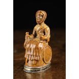 A Rare 19th Century Boxwood Snuff Box carved as "Martha Gunn" depicted wearing a bonnet,