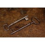 Two Large 18th Century Iron Keys; one 6" (15 cm) in length, 2" (5 cm) wide,