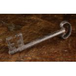An Early 16th Century Iron Key with faceted shaft 5" (13 cm) long, 1½" (3.5 cm) wide.