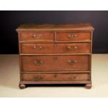 An 18th Century Chest of Drawers.