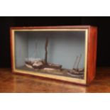 A 19th Century Diorama: The glass fronted case containing a wooden model of a paddle steamer