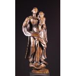 A Fine Early 18th Century Carved Limewood Sculpture of The Virgin & Child with coiled serpent at