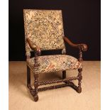 A 17th Century Walnut Armchair.