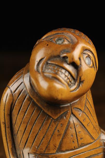 An Early 19th Century Carved Boxwood Snuff Box in the form of a defecating man. - Image 5 of 6