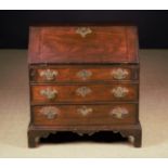 A Rare 18th Century Mahogany Child's Bureau of unusually small proportions.