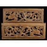 A Fine Pair of Early 16th Century Pierced Bare-wood Panels carved with fabulous zoomorphic beasts