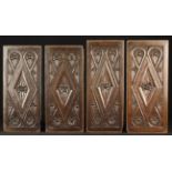 A Fine Set of Four Elizabethan Oak Panels carved with central lozenge motifs, leaves and berries,