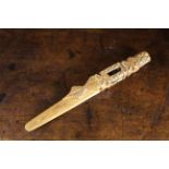 An Antique North Country Treen Knitting Sheath gouge carved with diagonal crosses and incorporating
