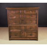 A Late 17th/Early 18th Century Oak Chest of Drawers in two sections.