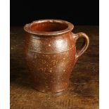 An Antqiue Lead Glazed Terracotta Baluster Pot with handle, 6¼" (16 cm) in height.