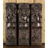 Three Early 17th Century Carved Oak Figural Pilasters depicting a caryatid and two bearded atlantes;