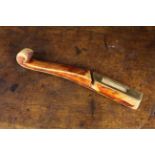 A 19th Century Northumberland Stained Ash Knitting Sheath of square curved section with scroll end,