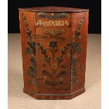 A 19th Century Scandinavian Painted Pine Folk Art Corner Cupboard.