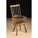 A Fine 18th Century Sycamore & Ash Comb back Windsor Armchair.