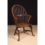 A Small Hoop-backed Windsor Armchair on cabriole legs, circa 1800.