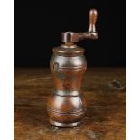 An 18th Century Turned Fruitwood Spice or Pepper Mill composed of three screw together sections