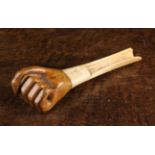 An Unusual Early 19th Century Sheep Bone Apple Corer with carved fruitwood handle in the form of a