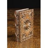 An Early 19th Century Welsh Chip Carved Cherry Wood Snuff Box in the form of a book,