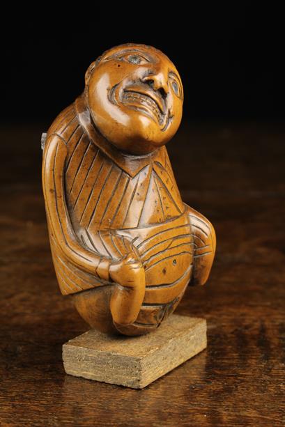 An Early 19th Century Carved Boxwood Snuff Box in the form of a defecating man. - Image 4 of 6
