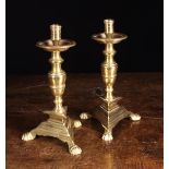 A Pair of Bronze Alloy Candlesticks.