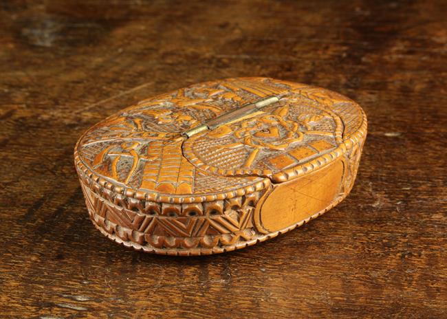 An Early 18th Century North European Oval Boxwood Snuff Box with a low releif carved scene of The - Image 3 of 5