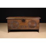 A Charles II Boarded Oak Coffer dated 1679.