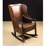 A Small and Charming Late 18th Century Oak Rocking Chair.
