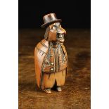 A Characterful Early 19th Century Carved Coquilla Nut Snuff Box carved in the form of a man with