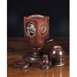 A Rare 17th Century English Lignum Vitae Coffee Mill enriched with engine-turned decoration.