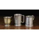 Three Antique Pewter Measures: A Pint Tankard with Victorian assay stamp and inscription to front: