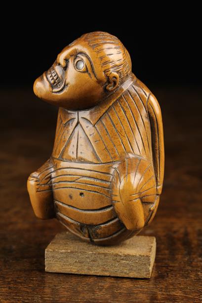 An Early 19th Century Carved Boxwood Snuff Box in the form of a defecating man. - Image 3 of 6