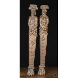 A Pair of 19th Century Carved Oak Figural Terminals.