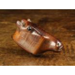 A 19th Century Mahogany Snuff Box carved in the form of a Horse's Head with inset black bead eyes