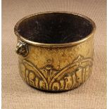 An 18th Century Brass Repoussé Wine Cooler of cylindrical form decorated with gadrooning and