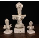 Three Carved Stone Gothic Revival Architectural Finials crested with foliage.