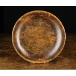 An 18th Century Sycamore Food Platter profusely scored with knife marks and having a rich colour