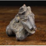 A Naive Root Carving in the form of a animal's head, 5" (12.5 cm) in length.