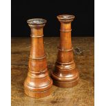 A Matched Pair of Turned Fruitwood Candlesticks,