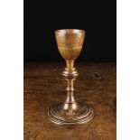 A Rare 17th Century Treen Communion Chalice retaining traces of residual gilding.