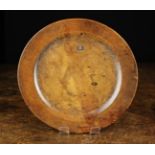 An 18th Century Turned Sycamore Plate of fine colour and patination,