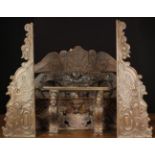 A Group of 19th Century Fragment Carvings (A/F): An Oak Rail emblazoned with a facemask to the